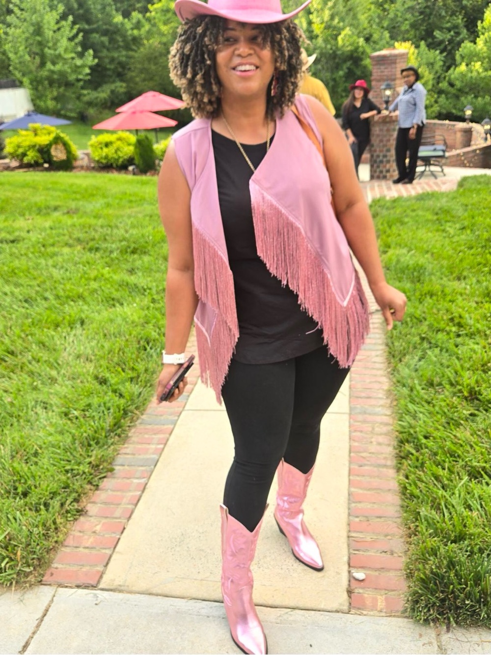 Women’s Pink Fringe Vest with matching boots and cowgirl hat